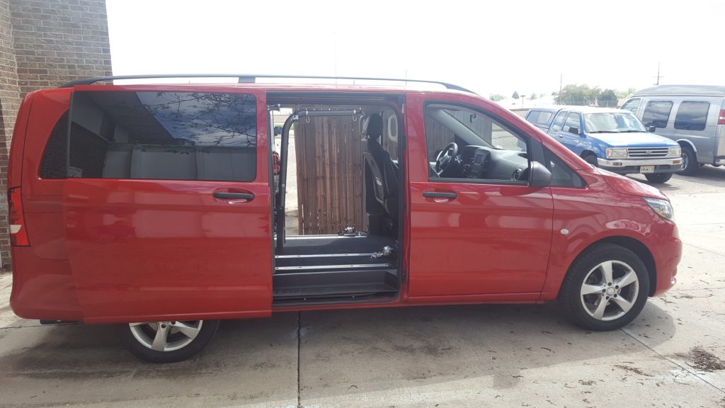 Red van with the Superarm Lift System